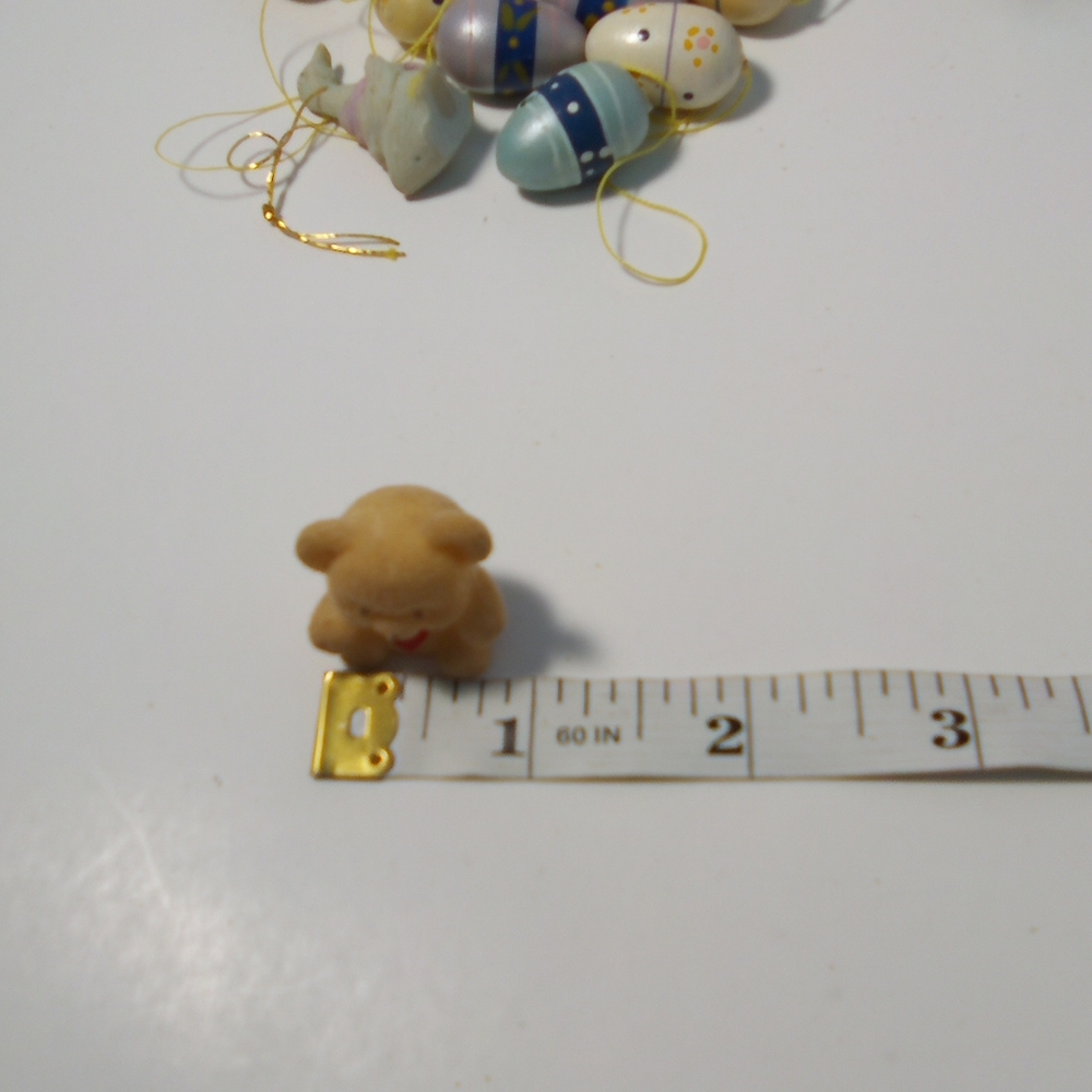 Vintage Pink Egg-Shaped Shelf with Easter Decorations - Picture 7 of 14